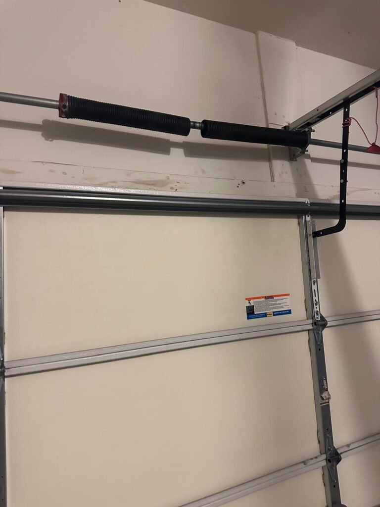 garage door making loud noise causes Manassas Park Teo Garage Doors repair