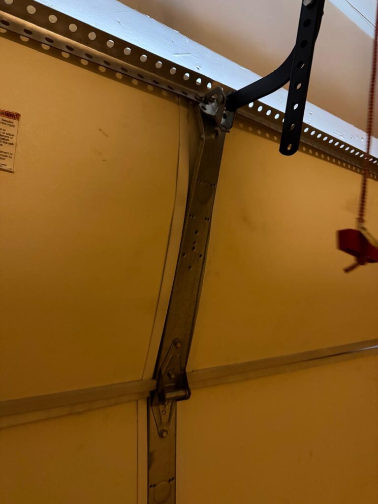 garage door off track causes dangers repair Manassas Park Teo Garage Doors